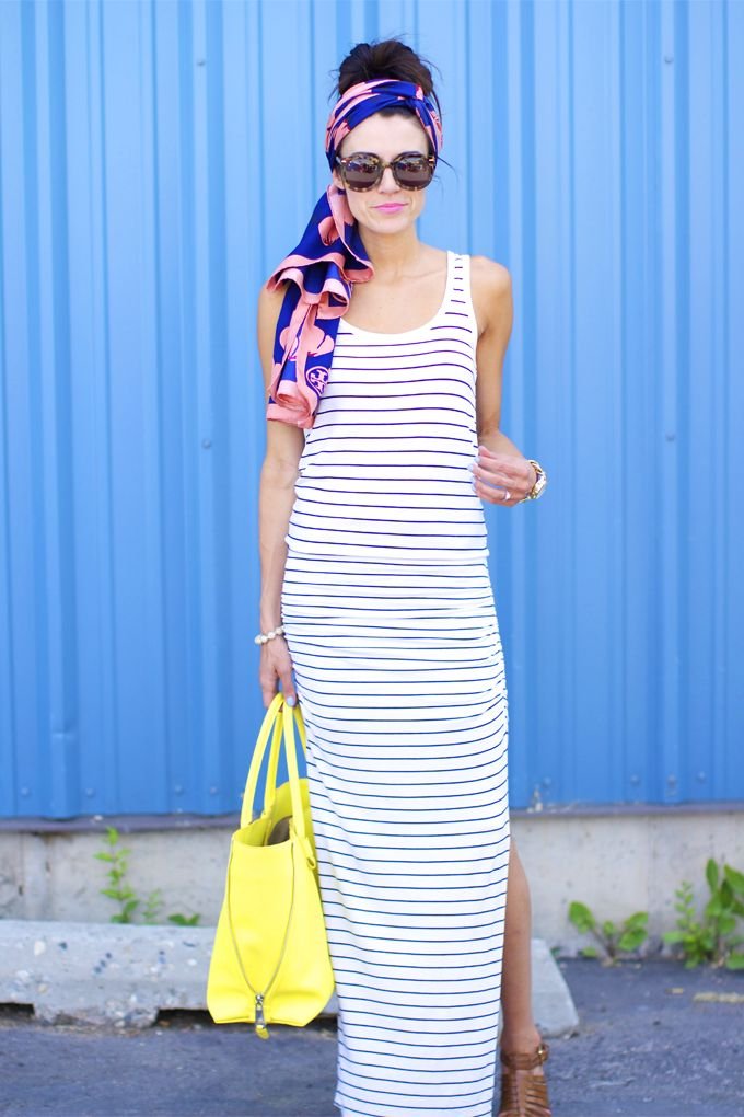 Striped maxi dress, fun printed head scarf, and a bright statement bag!